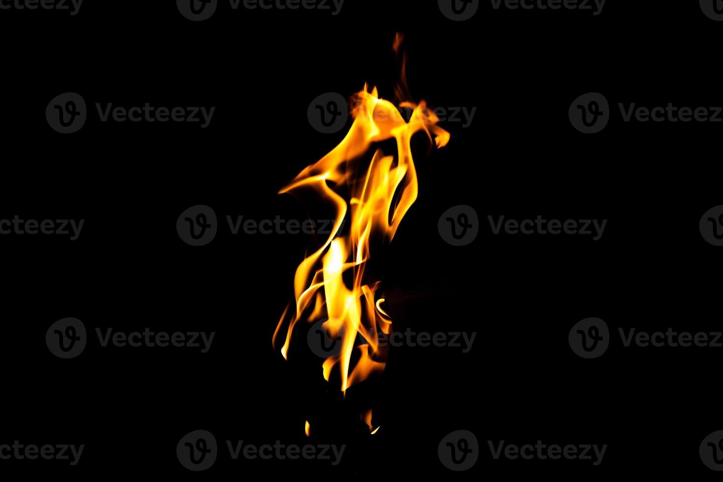 Fire flame texture. Burning material backdrop. Burn effect pattern. Blaze and torch wallpaper. Heat and haze backdrop. photo