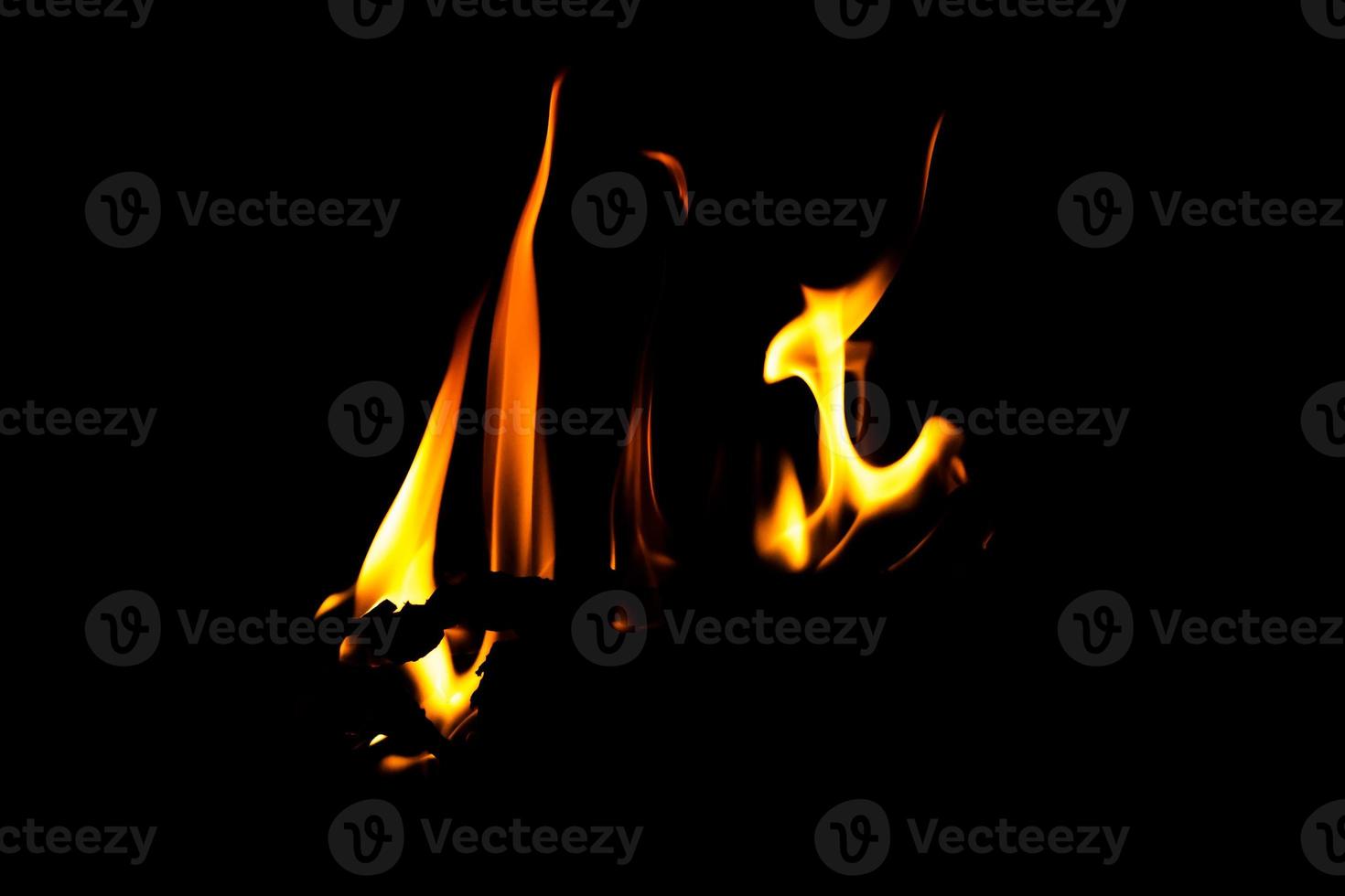 Fire flame texture. Burning material backdrop. Burn effect pattern. Blaze and torch wallpaper. Heat and haze backdrop. photo