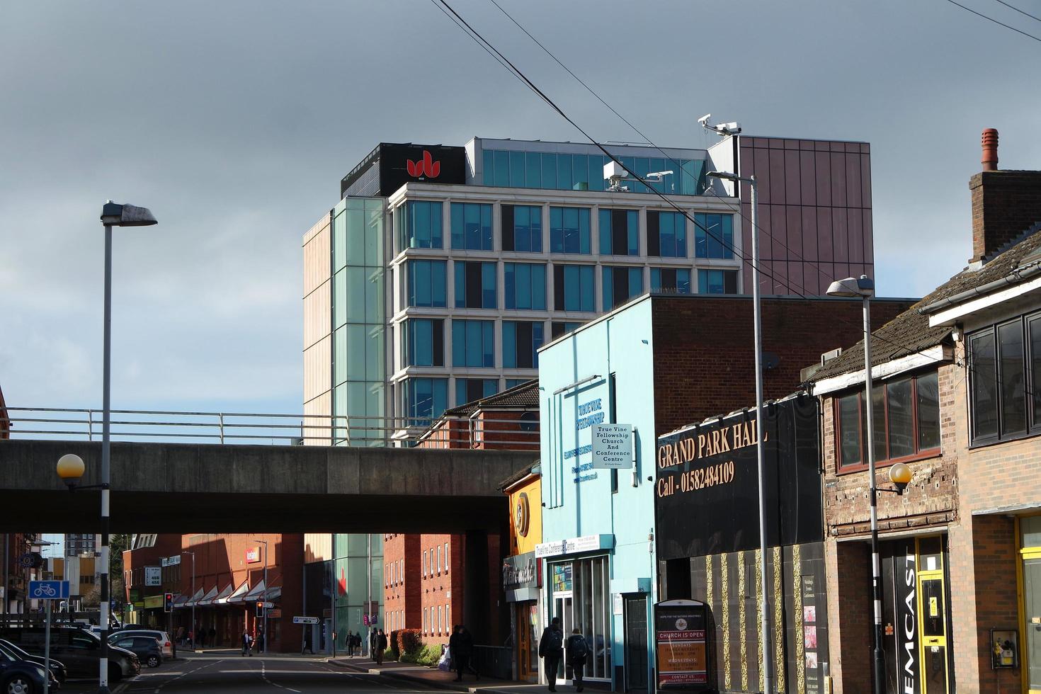 Low Angle View of Downtown City Center of British City London Luton Town of England UK. The Image Was Captured at Central Luton  City During a Cold and Cloudy Evening of 26-March-2023 photo