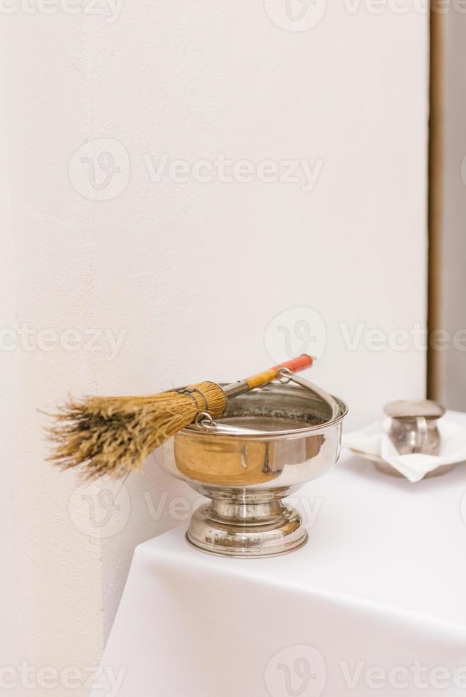 The baptismal cup in the Catholic church photo