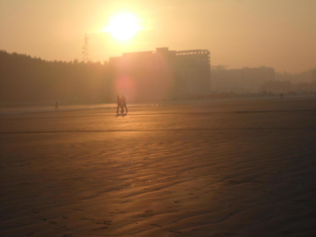 Sunrise at the beach of the Bay of Bengal, Bangladesh. Travel and Vacation. photo