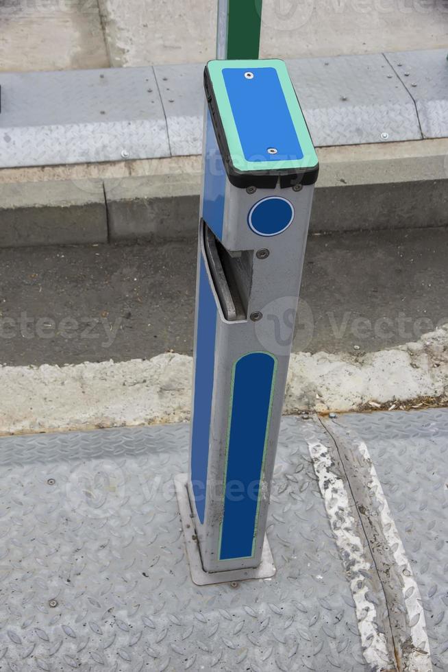 Empty bike sharing station. Modern blue bikes at city rental station on sunny day photo