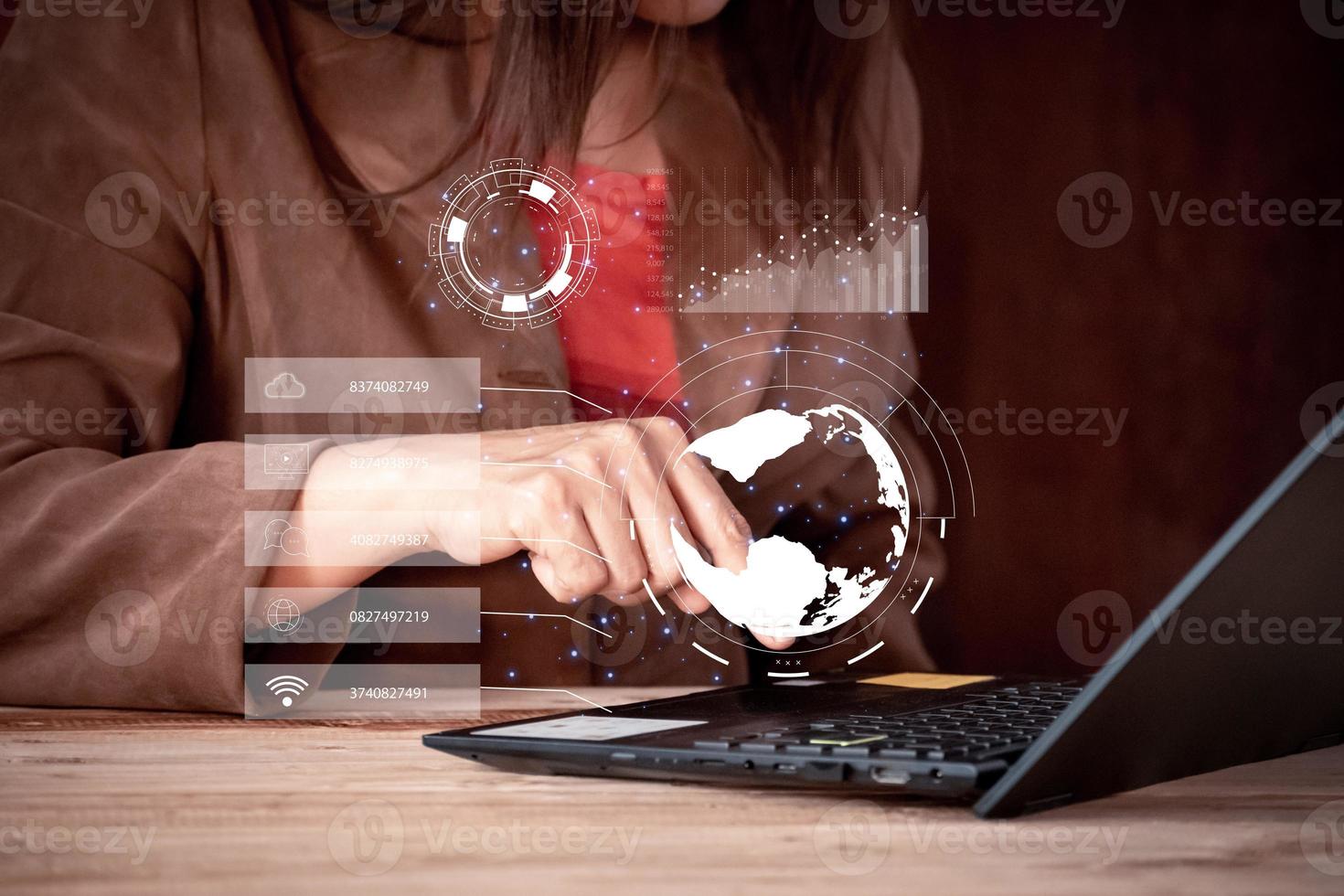 businesswoman working with laptop computer and holding global network connection and graph business diagram, cyber secutity tip. photo