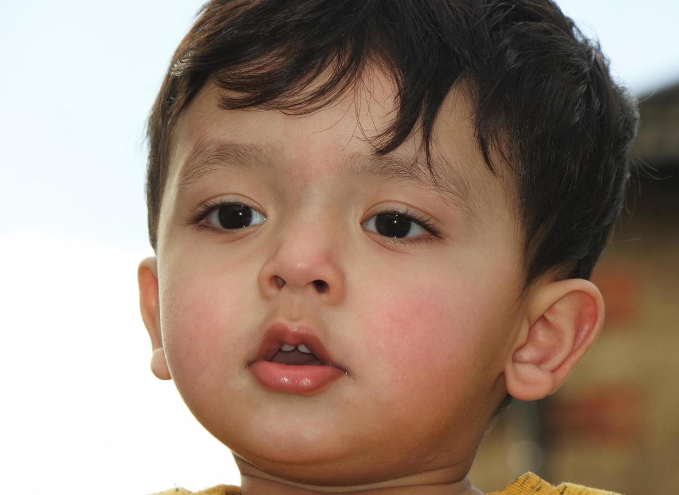 Cute Asian Pakistani Baby, Ahmed Mustafain Haider is Posing at Home. Originally he is from Pakistan but Live at Luton England UK. Image was Captured on 02-April-2023 photo