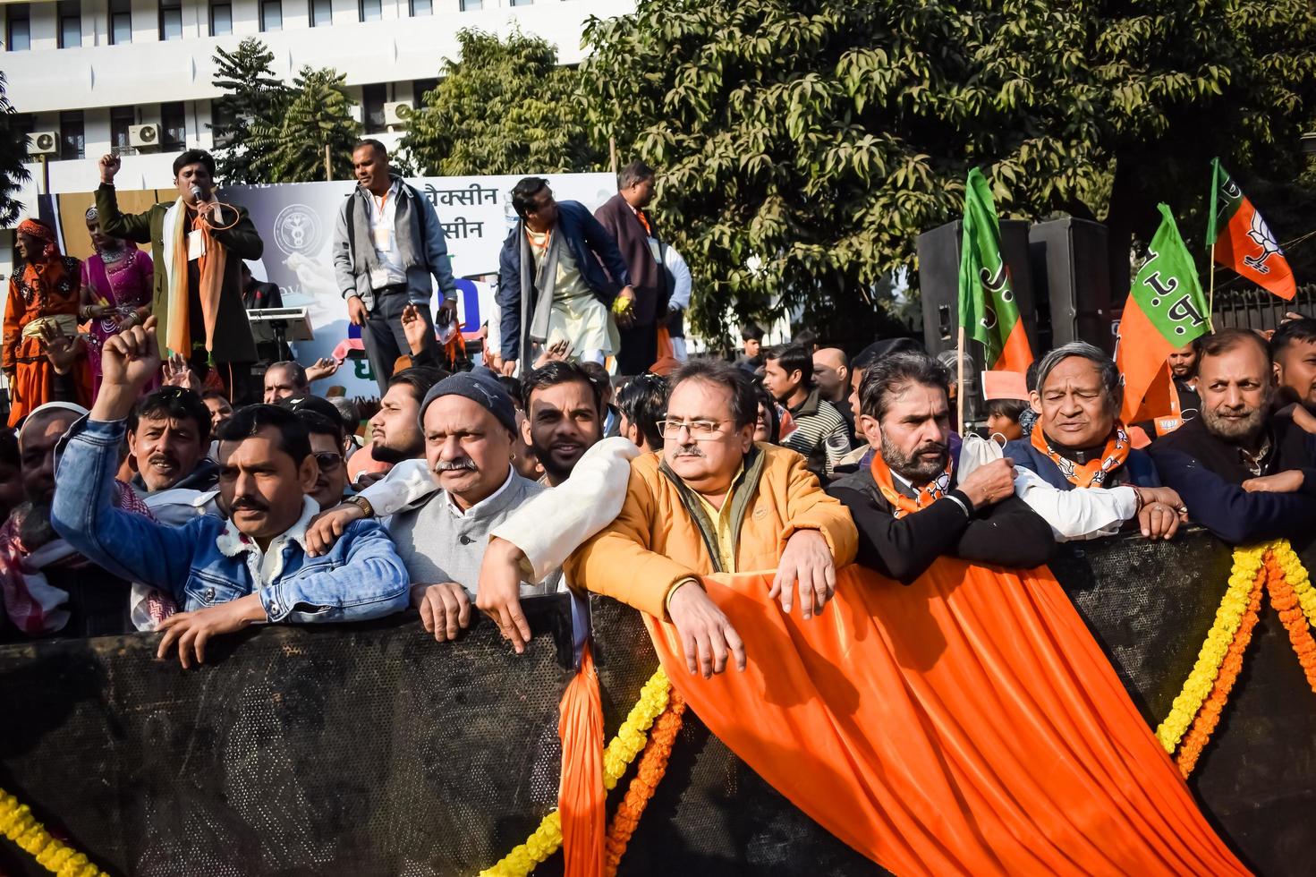 New Delhi, India - January 16 2023 - Thousands of people collected during Prime Minister Narendra Modi BJP road show, people during PM Modi big election rally in the capital photo