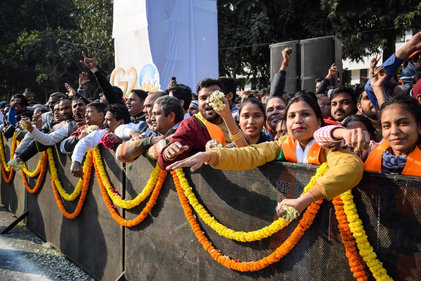New Delhi, India - January 16 2023 - Thousands of people collected during Prime Minister Narendra Modi BJP road show, people during PM Modi big election rally in the capital photo