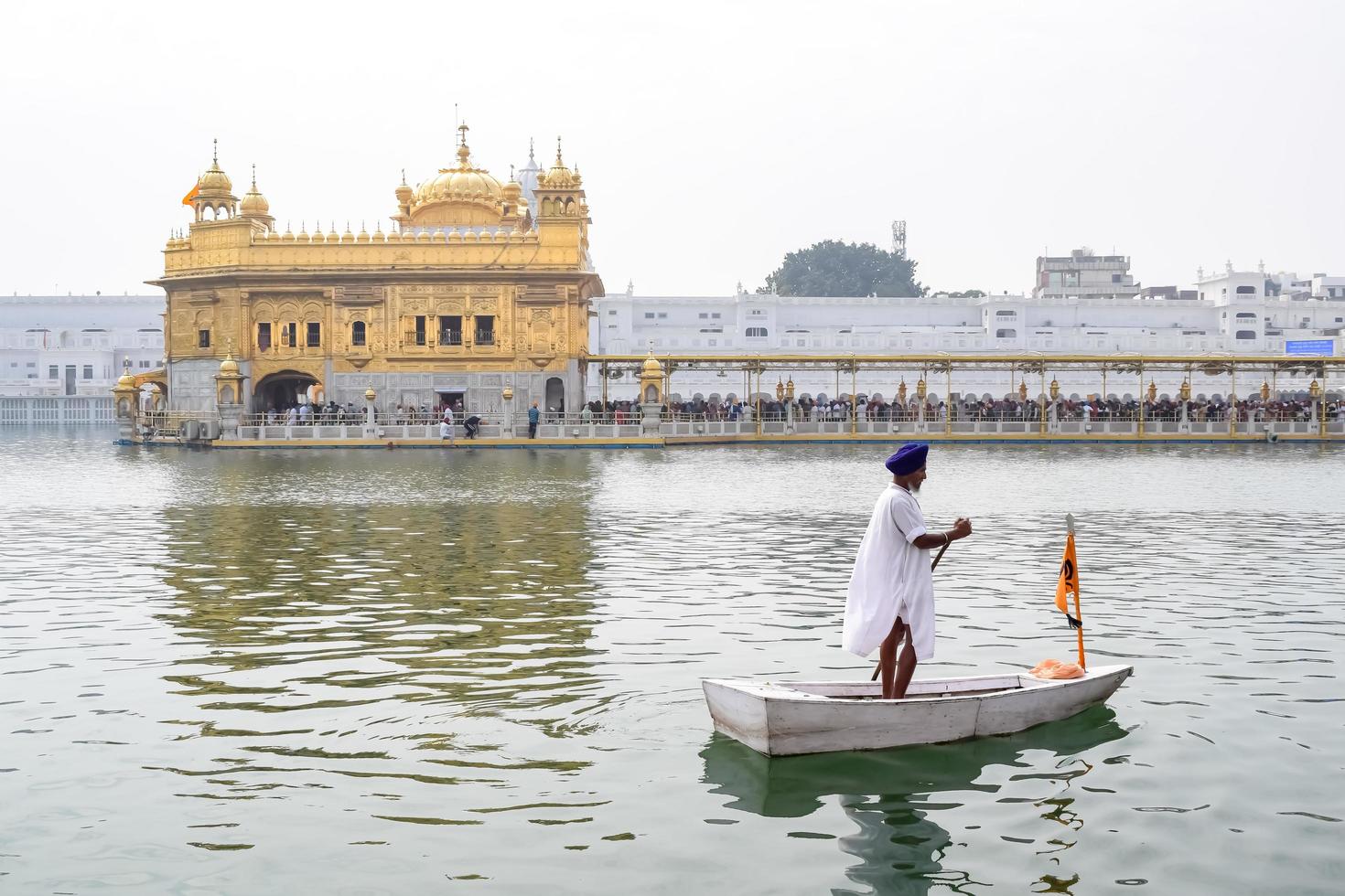 Amritsar, India - February 26 2023  - Unidentified devotees from various parts at Golden Temple - Harmandir Sahib in Amritsar, Punjab, India, Famous indian sikh landmark, Golden Temple photo