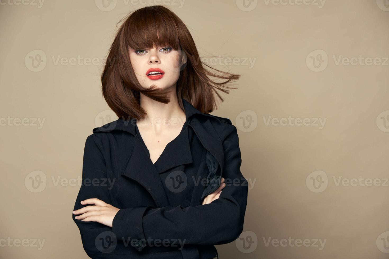 Attractive woman black coat elegant style having fun studio photo