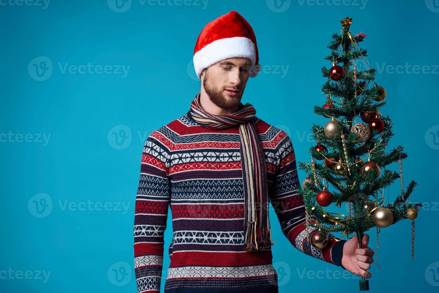 handsome man with a phone in hand holiday christmas technology studio posing photo