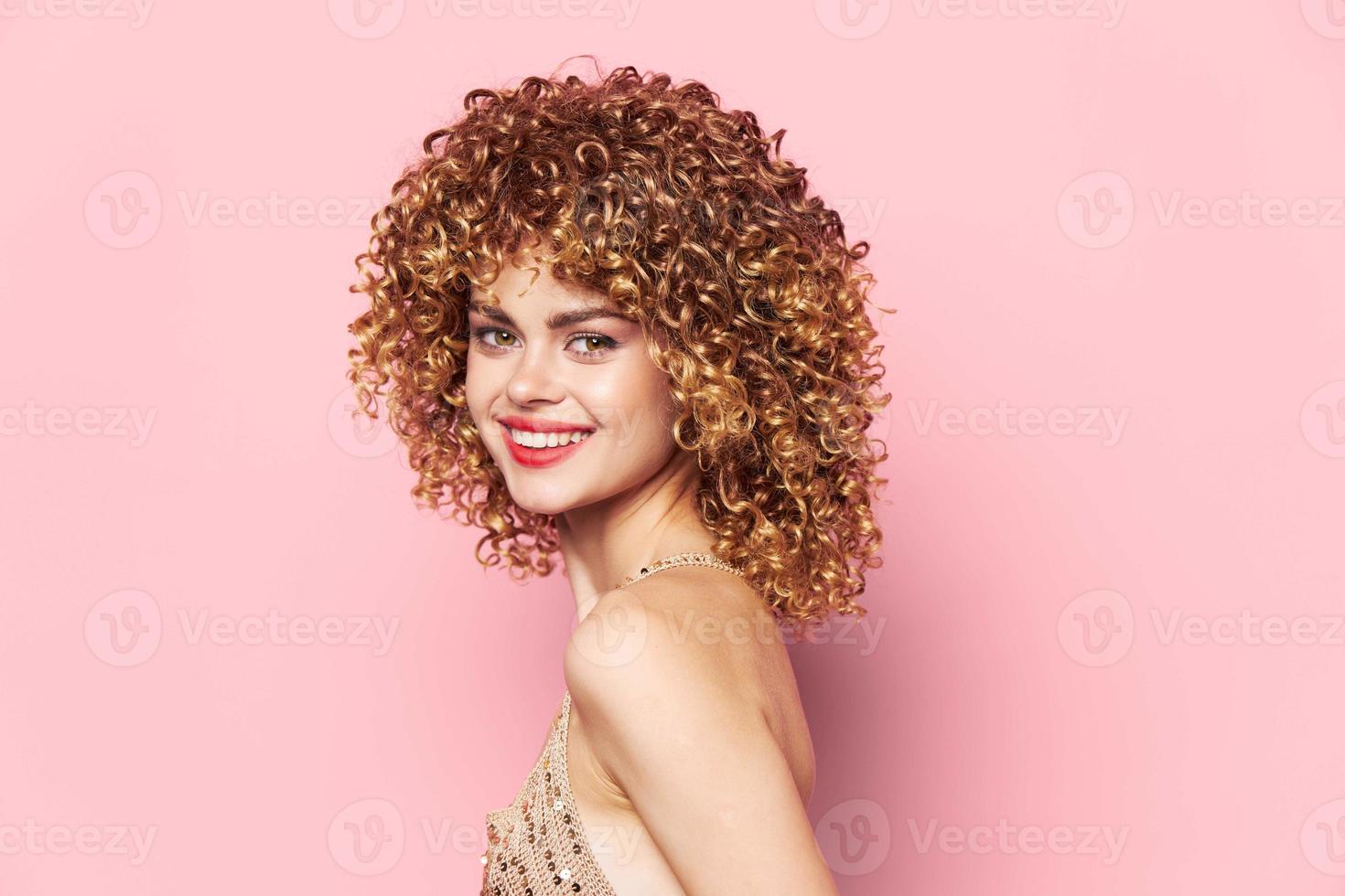 Attractive girl Curly hair smile red lips studio bright makeup photo