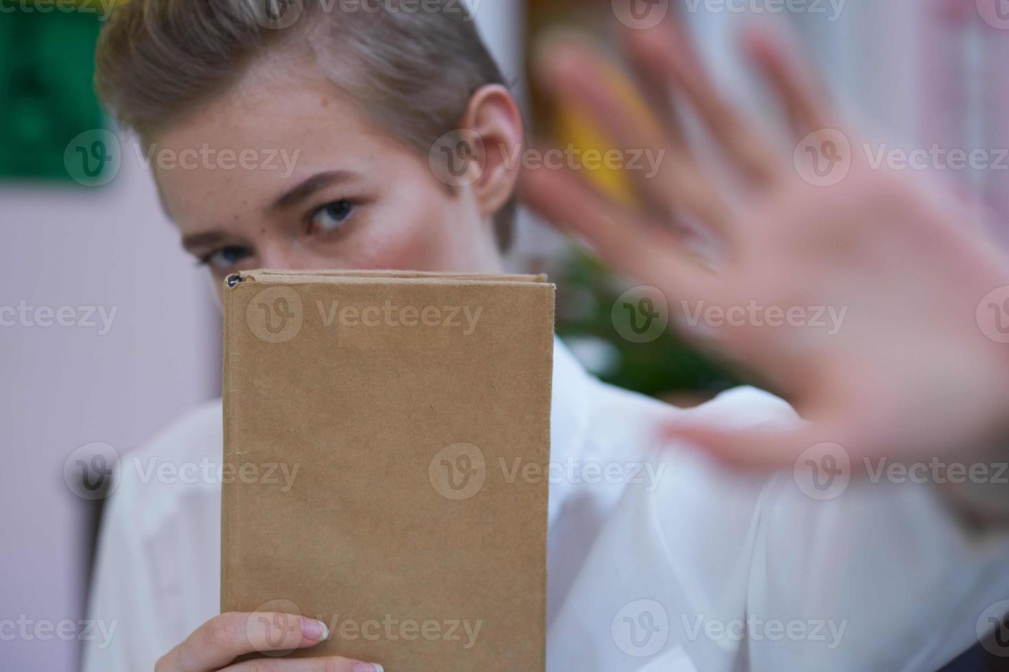 short haired woman reading walk in the fresh air education photo