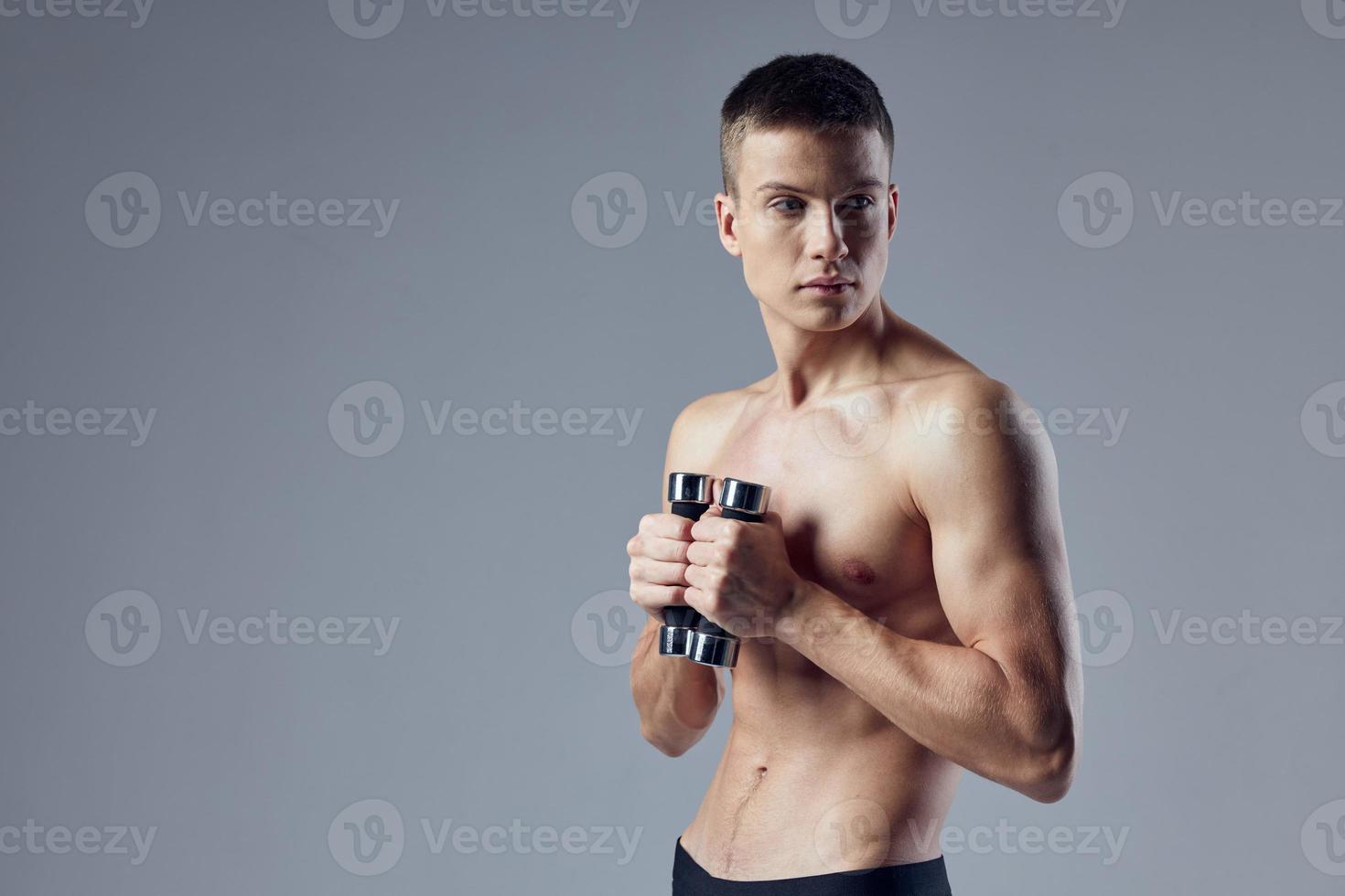 sport man workout motivation dumbbells in hand exercise cropped cropped view photo