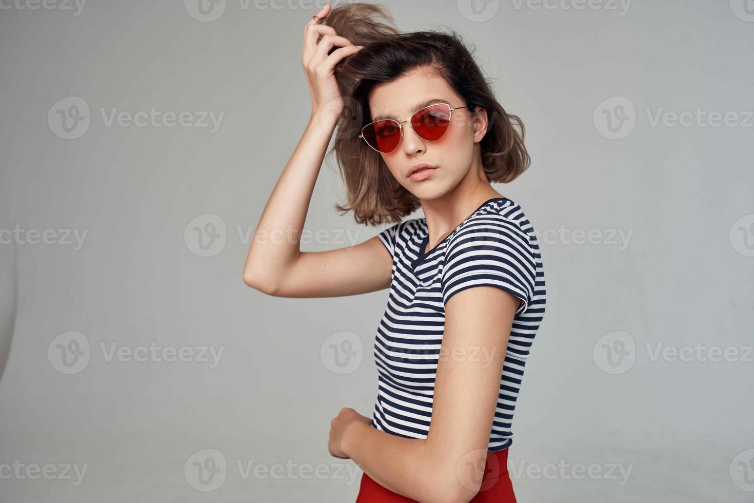 beautiful woman with glasses posing Studio photo