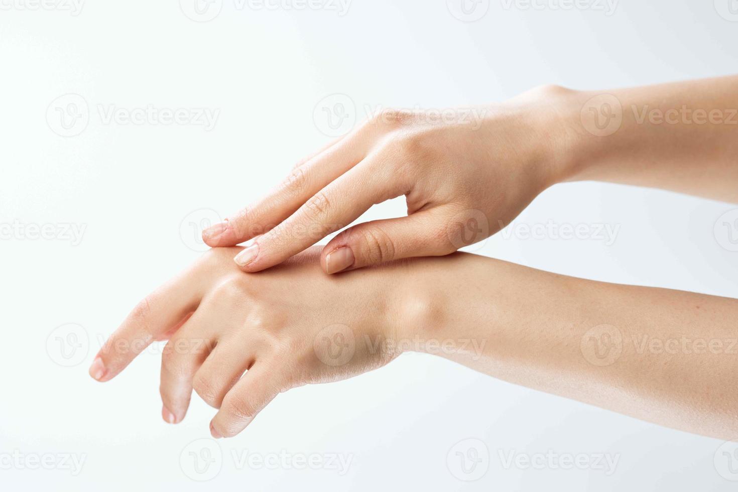 female hands skin care moisturizing medicine close-up photo