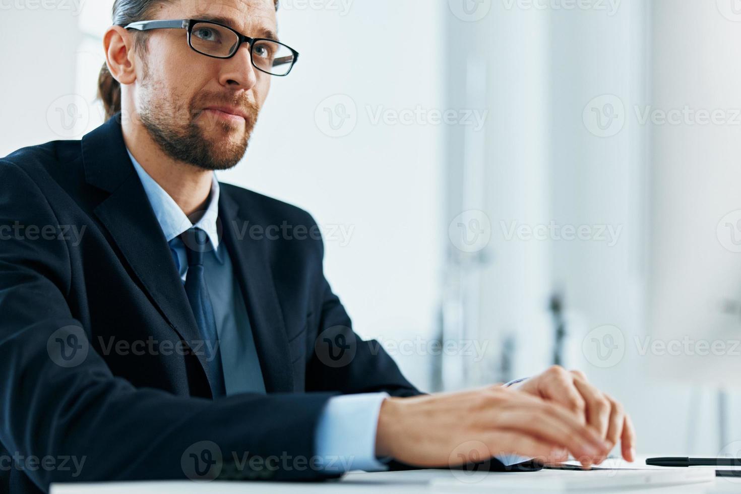 business man wearing glasses work desk computer office manager photo