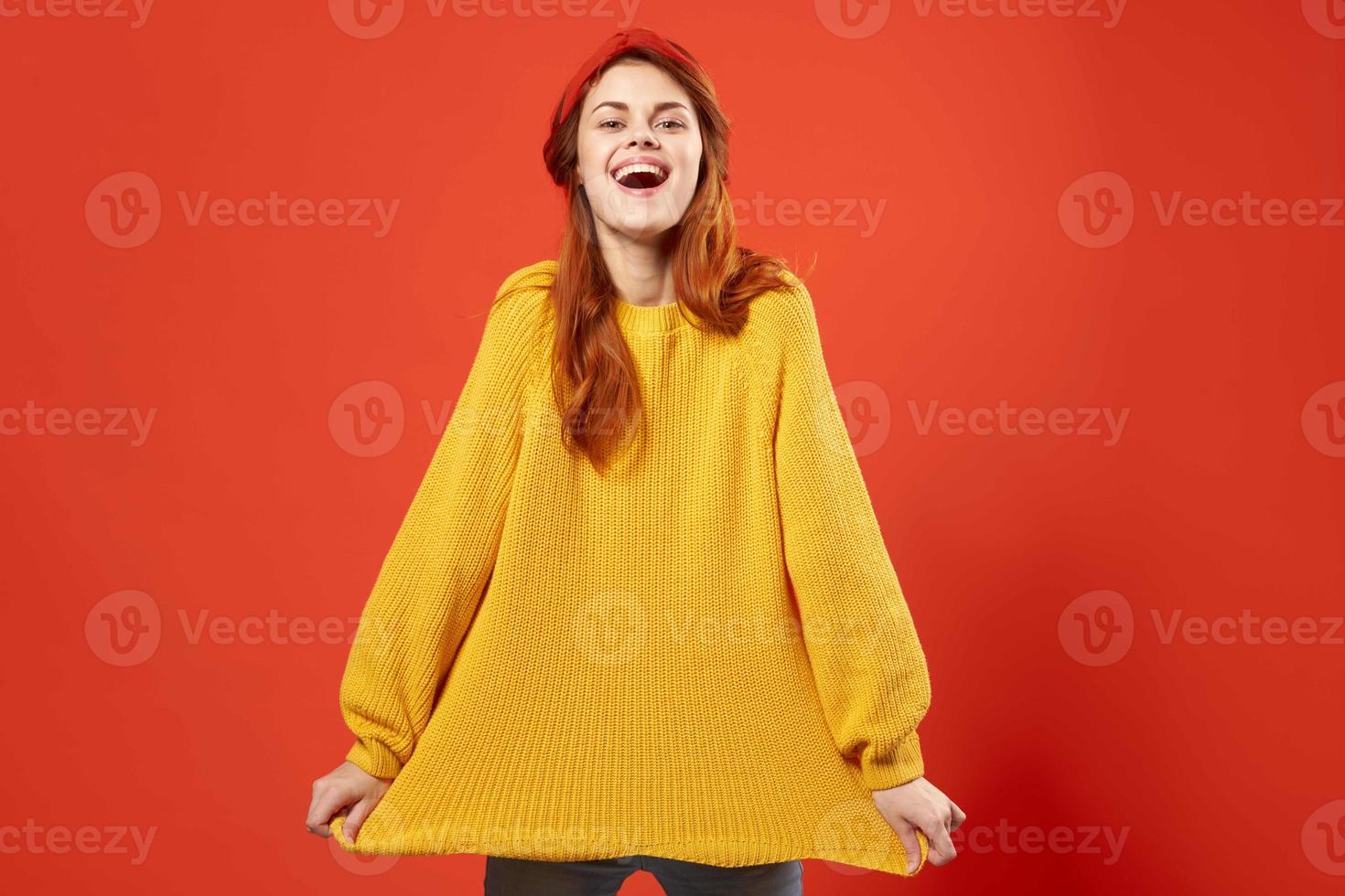 woman in yellow sweater with red headband modern style hipster accessories photo