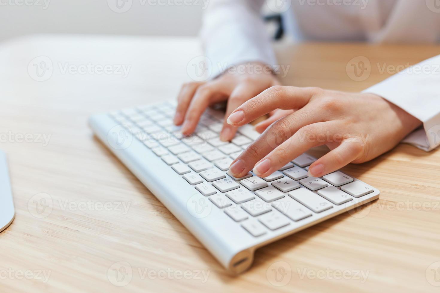 Closeup shot hands of businesswoman journalist office worker freelancer typing report doing documents on keyboard. Online communication, Remote job or Education. Copy space, wide angle photo