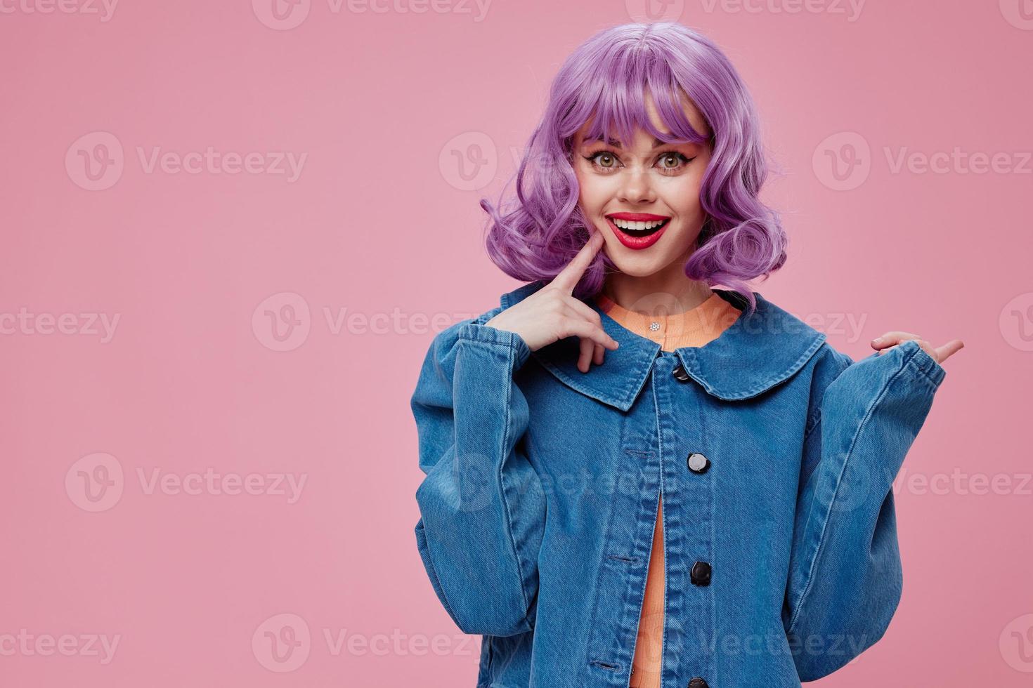 Beautiful fashionable girl purple hairstyle red lips denim jacket fun color background unaltered photo