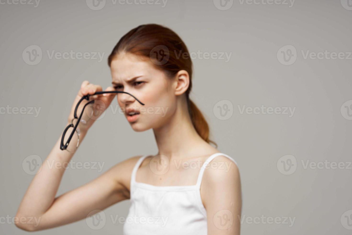 disgruntled woman vision problems myopia isolated background photo