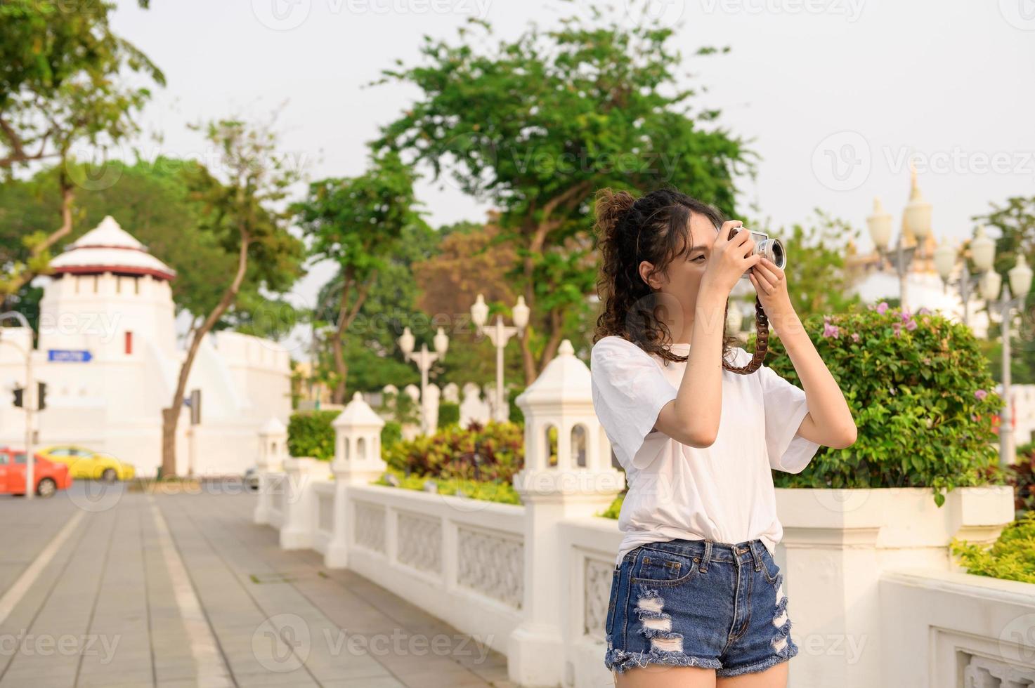 Beautiful young Asian tourist woman on vacation sightseeing and exploring Bangkok city, Thailand, Holidays and traveling concept photo