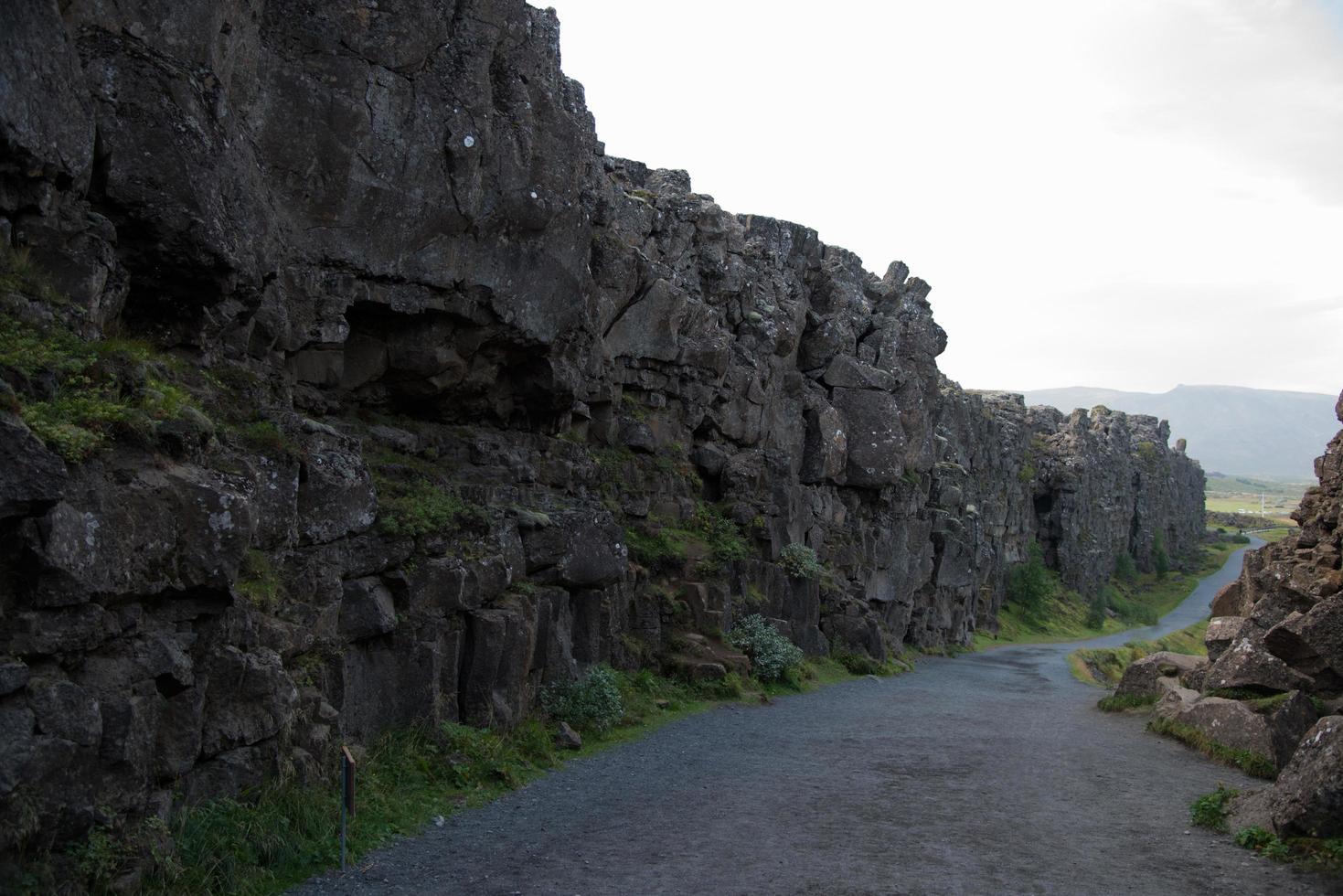 Walking path between tectonic plates at Thingvellir National Park, Iceland photo