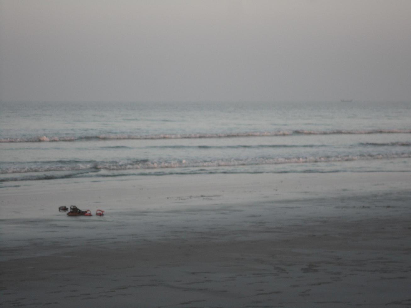 Photo of natural landscape view of beautiful winter beach and sea on a sunny day in Cox's Bazar, Bangladesh. Travel and Vacation.