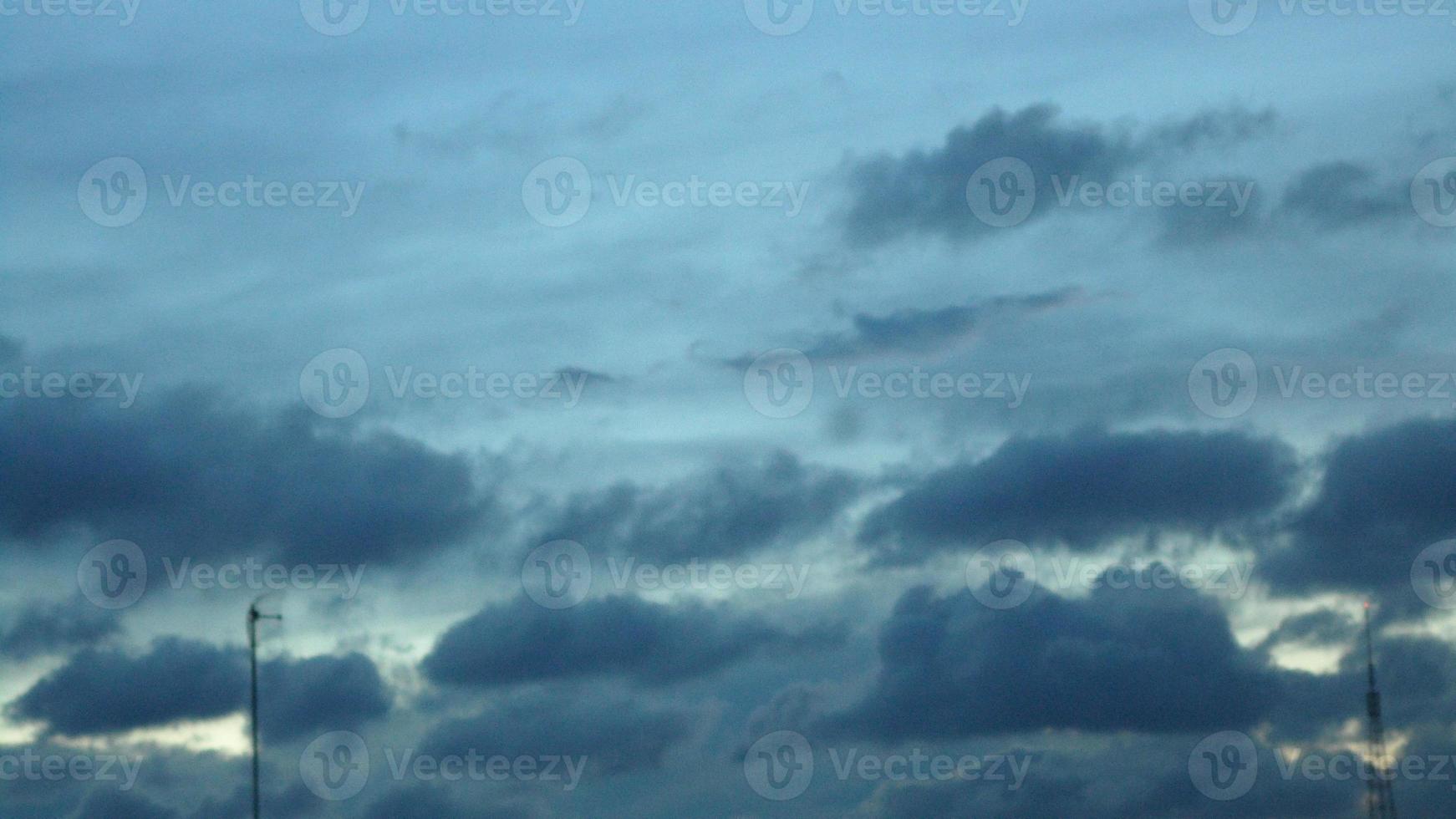 Beautiful clouds in the sky at sunset moment in a town in Bangladesh, Asia photo