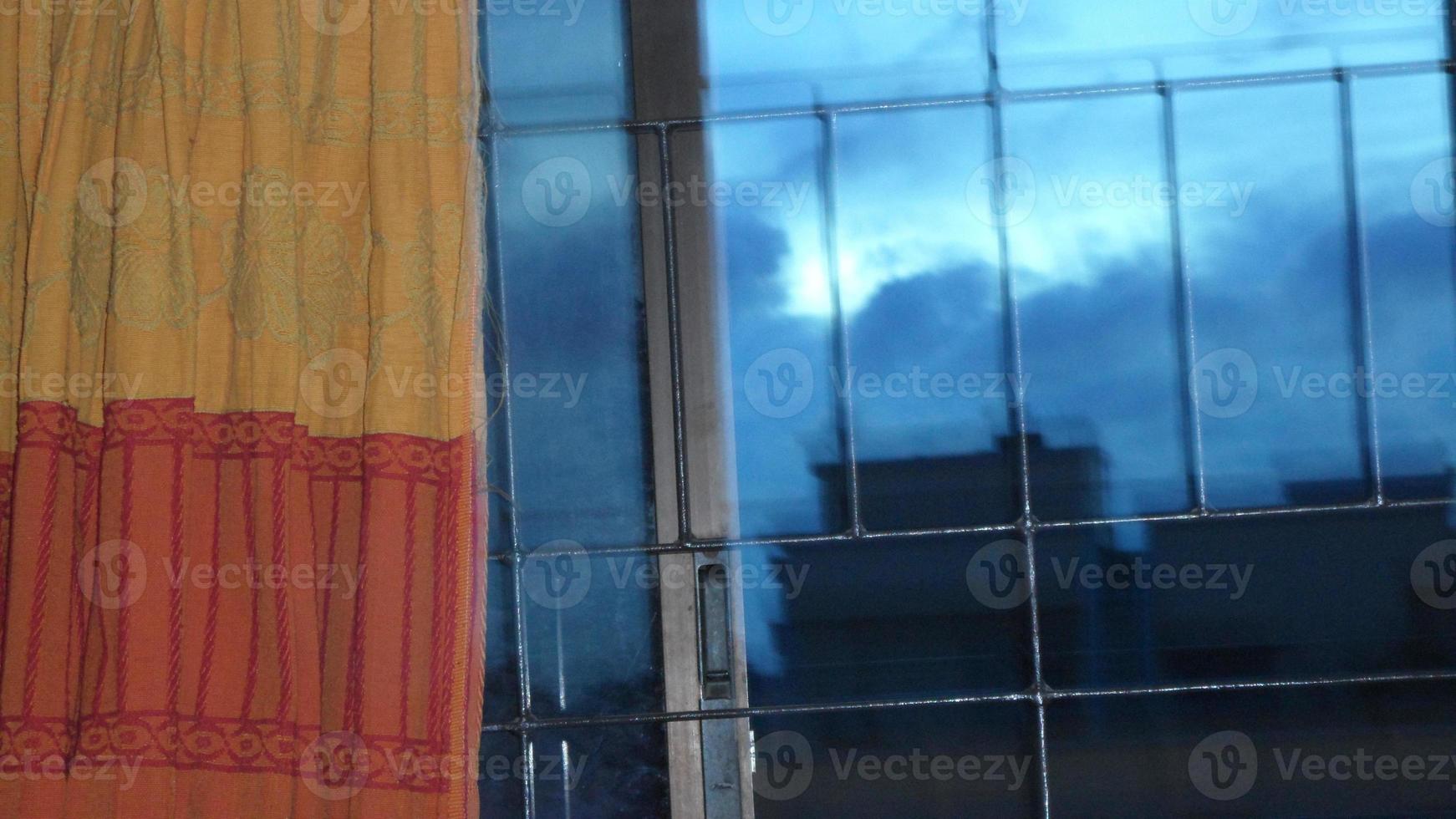 Beautiful clouds in the sky at sunset moment in a town in Bangladesh, Asia photo