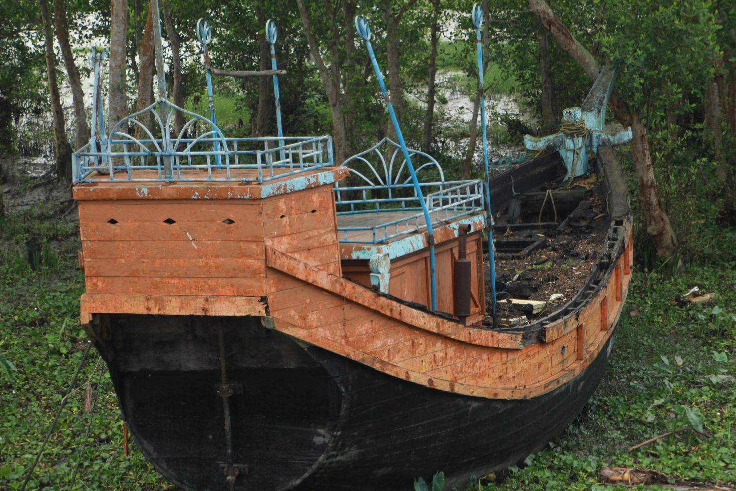 A boat that has been damaged by the storm photo