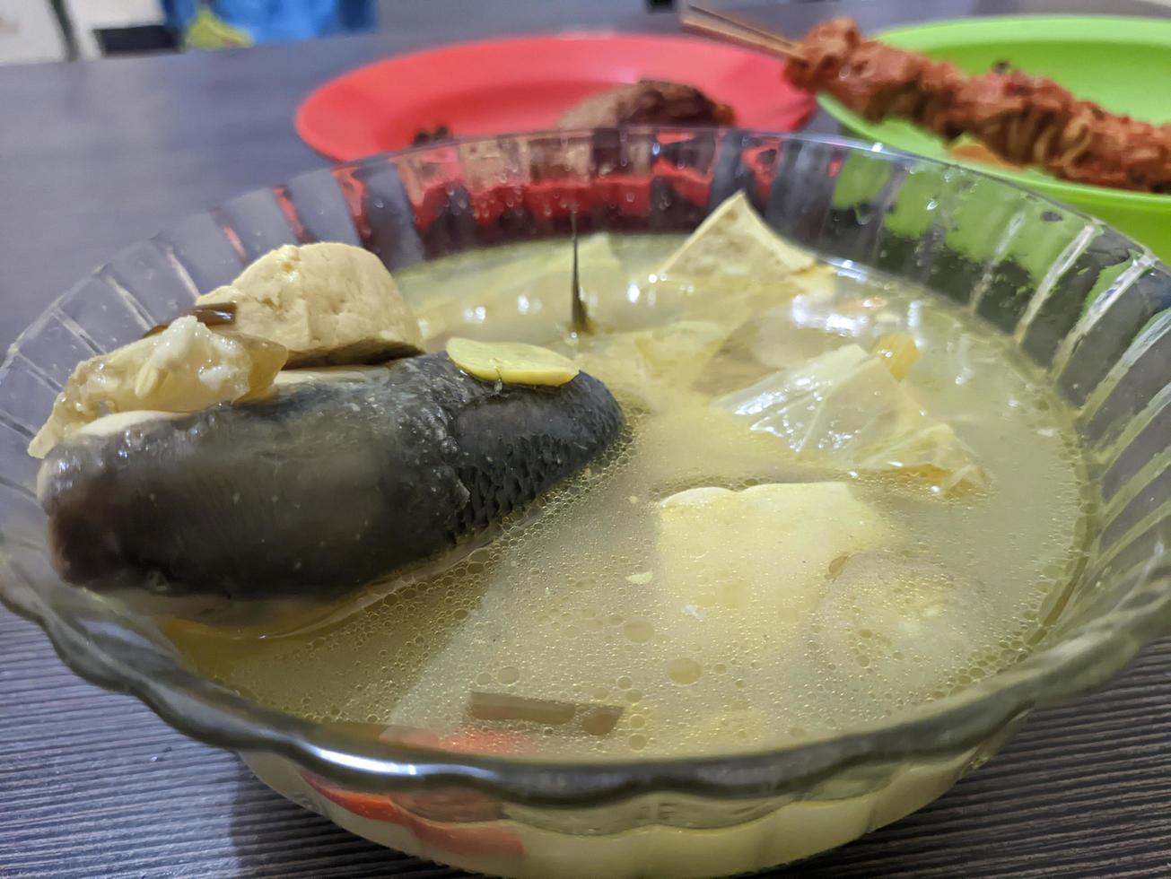 A milkfish soup or sup ikan bandeng. Delicious indonesian food. For food background or wallpaper photo