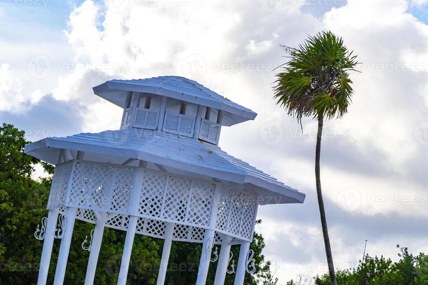 White noble pergula pavilion in paradise on beach palms Mexico. photo