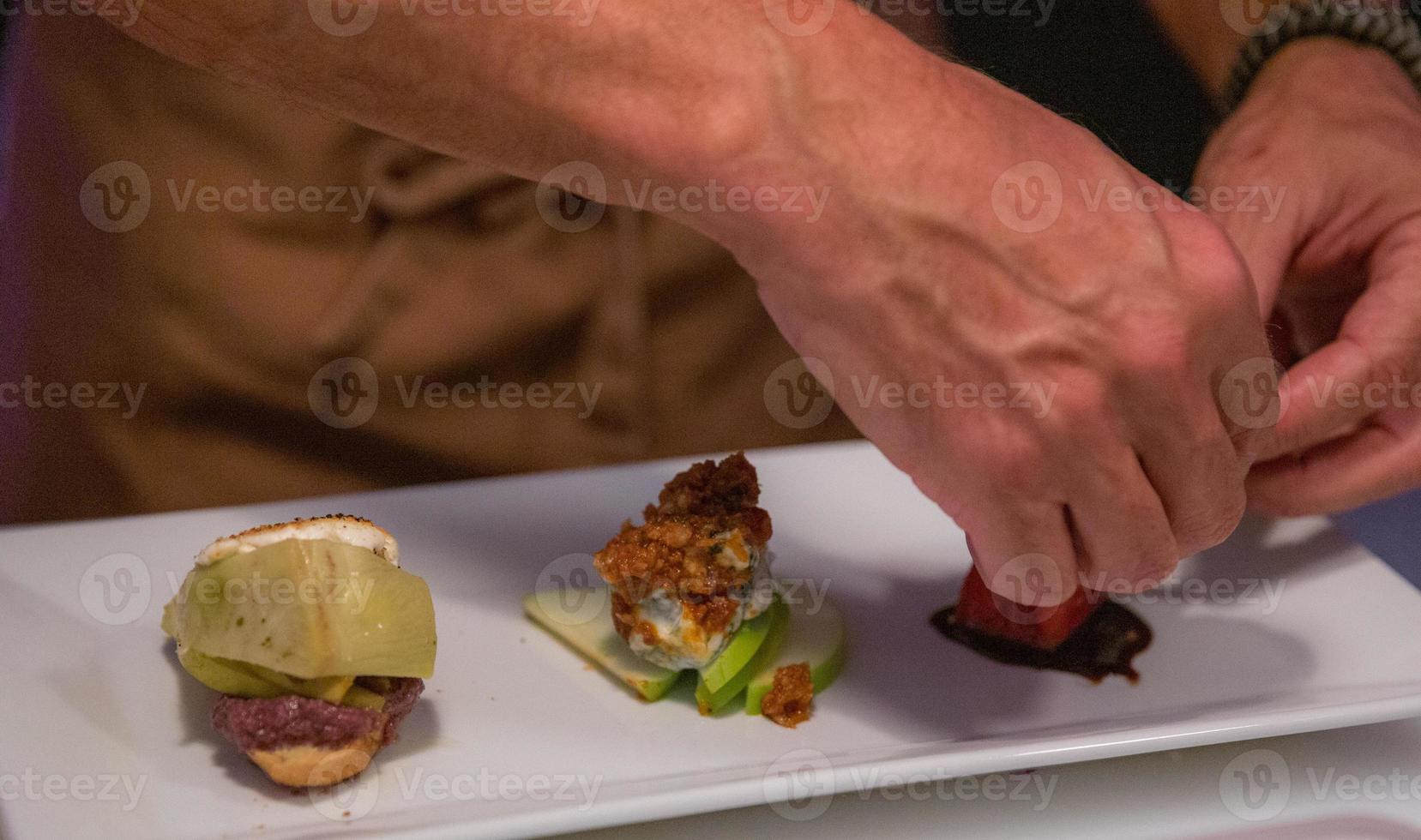 Chef preparing an appetizer photo