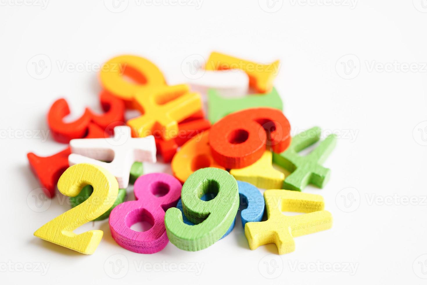 Number wood block cubes for learning Mathematic, education math concept. photo