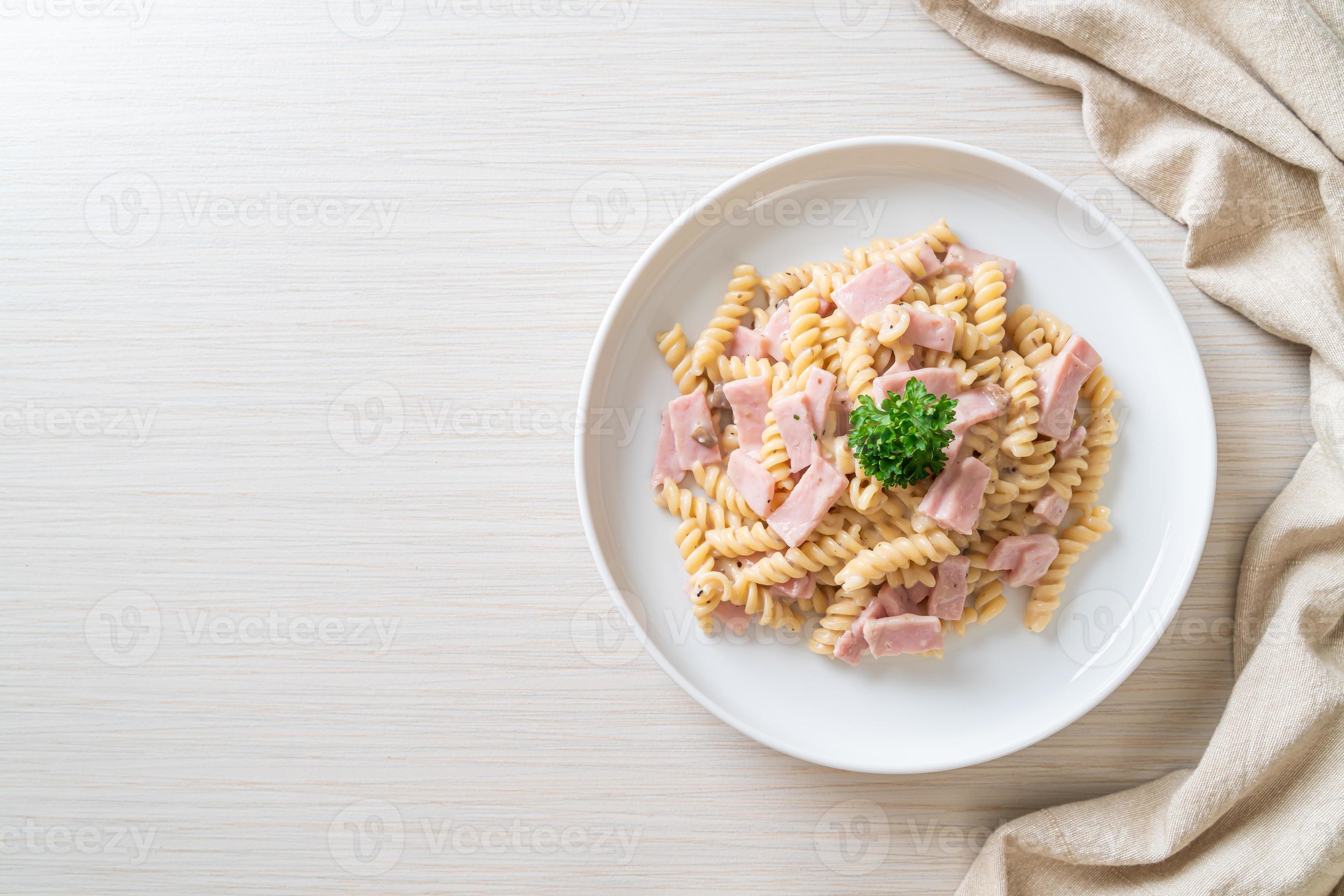 spiral pasta mushroom cream sauce with ham 22346891 Stock Photo at Vecteezy
