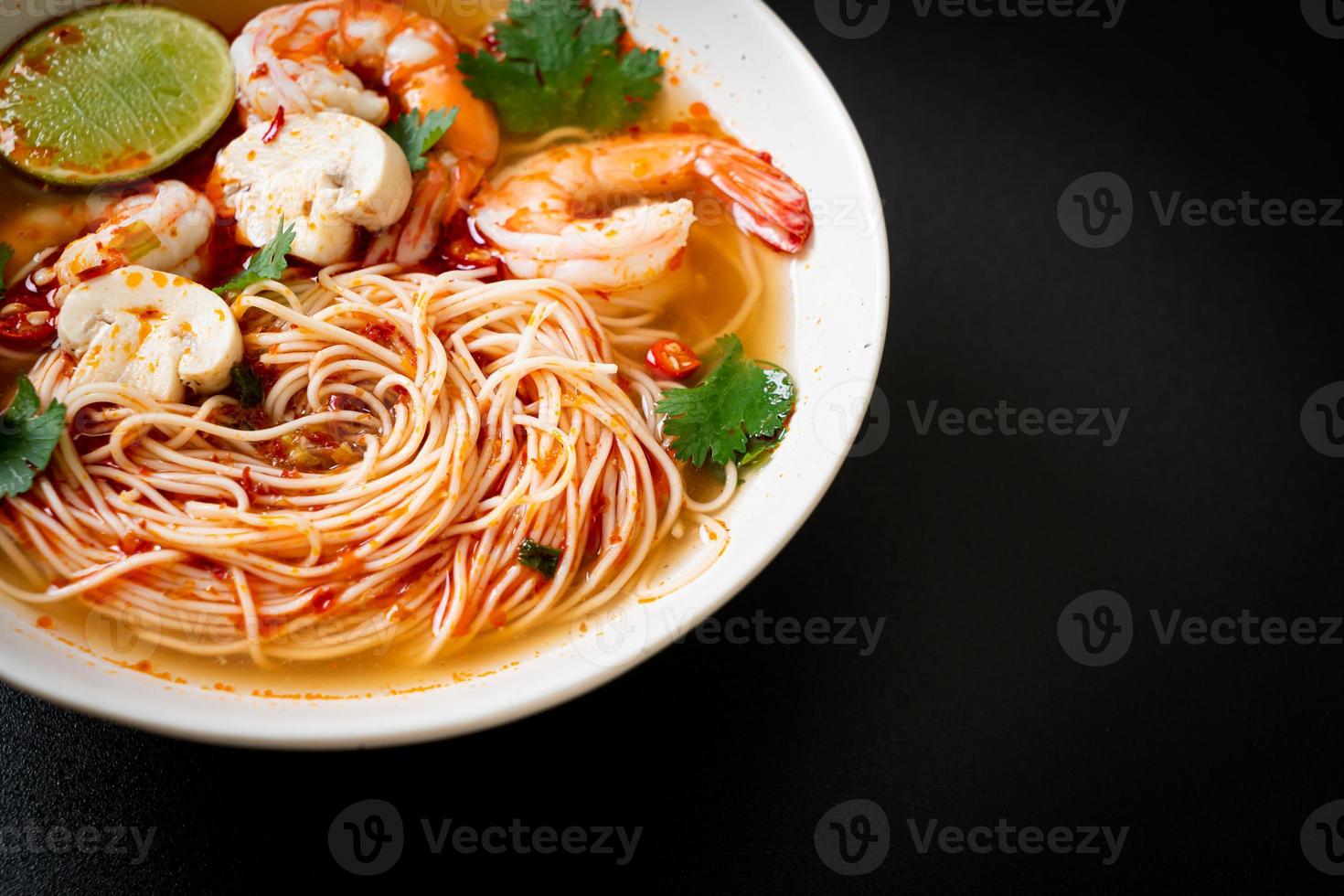 noodles with spicy soup and shrimps or Tom Yum Kung photo