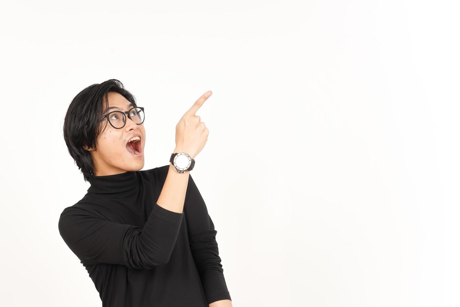 Showing Product and Pointing Side using forefinger with WOW Face Of Handsome Asian Man photo