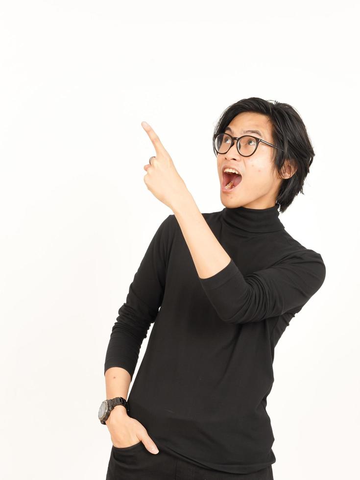 Showing Product and Pointing Side using forefinger with WOW Face Of Handsome Asian Man photo