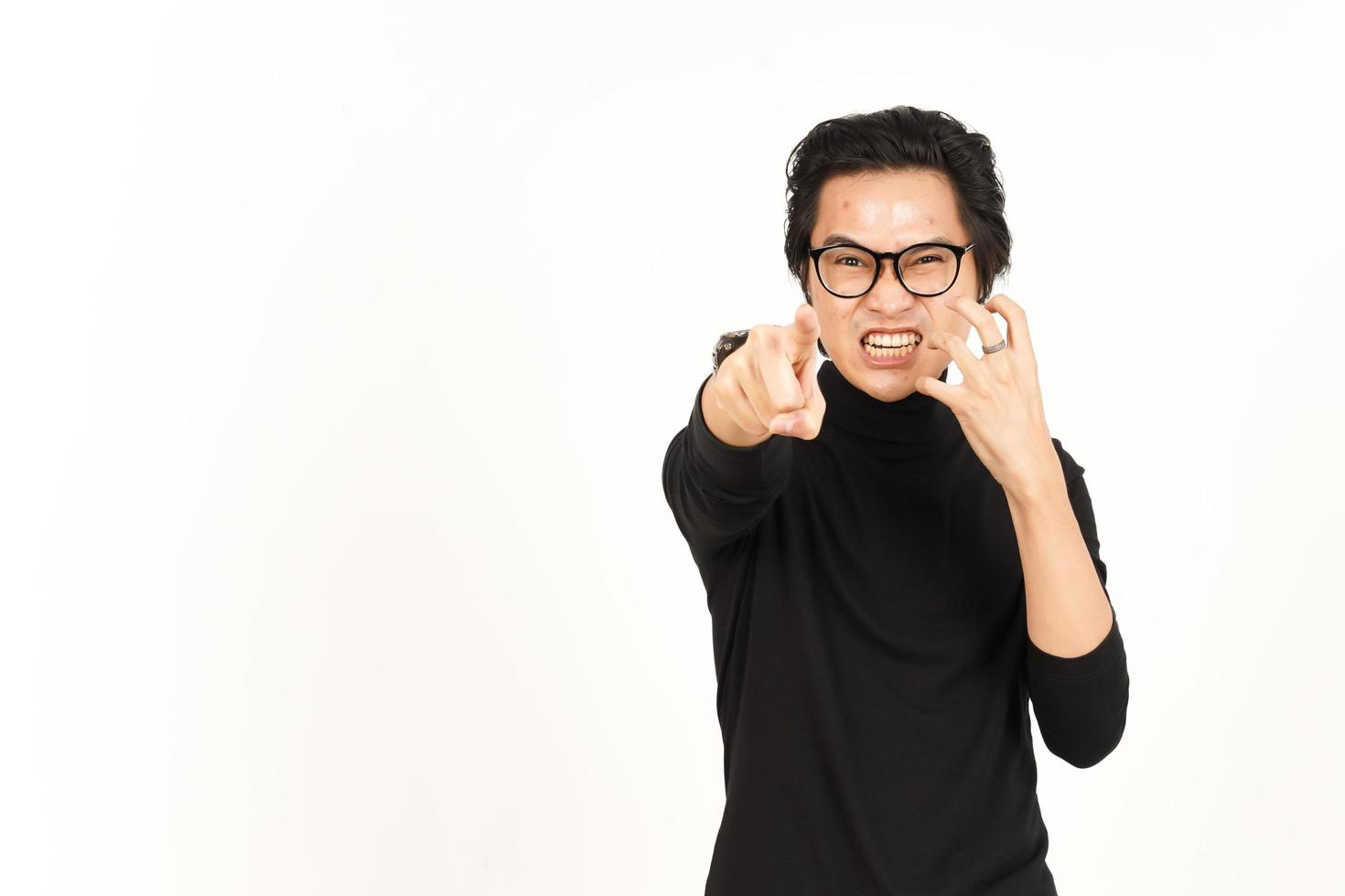 Angry screaming and Pointing at you Of Handsome Asian Man Isolated On White Background photo