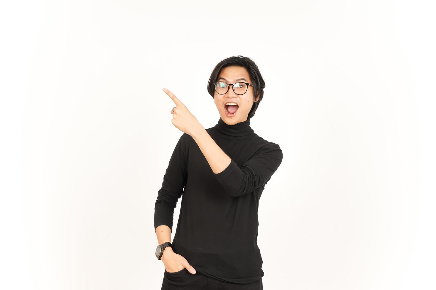 Showing Product and Pointing Side using forefinger with WOW Face Of Handsome Asian Man photo