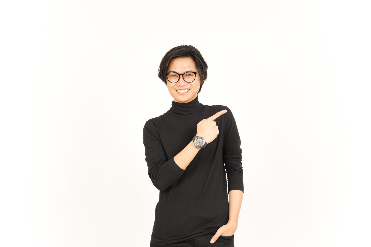 Showing Product and Pointing Side using forefinger Of Handsome Asian Man Isolated On White photo