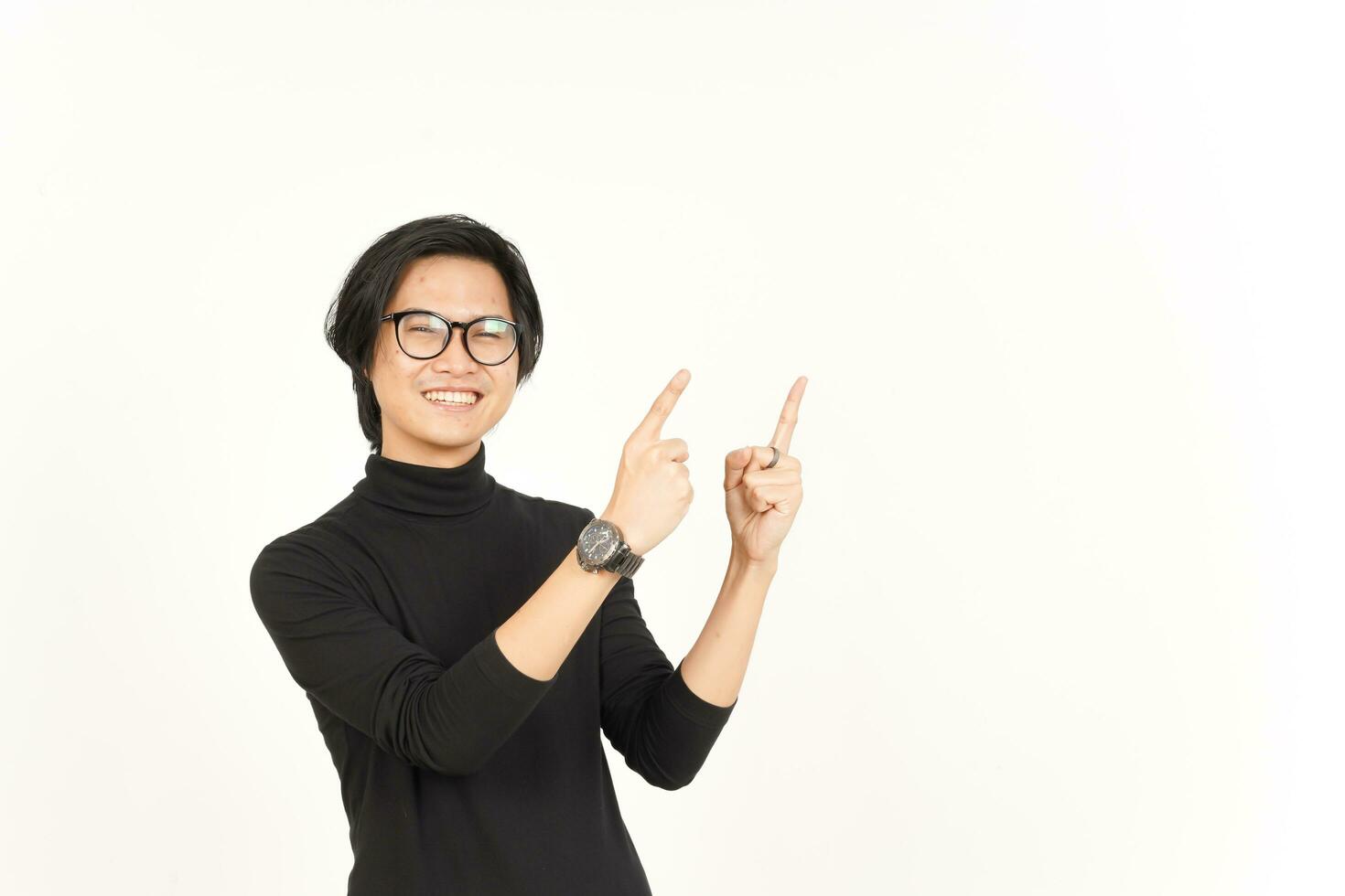 Showing Product and Pointing Side using forefinger Of Handsome Asian Man Isolated On White photo