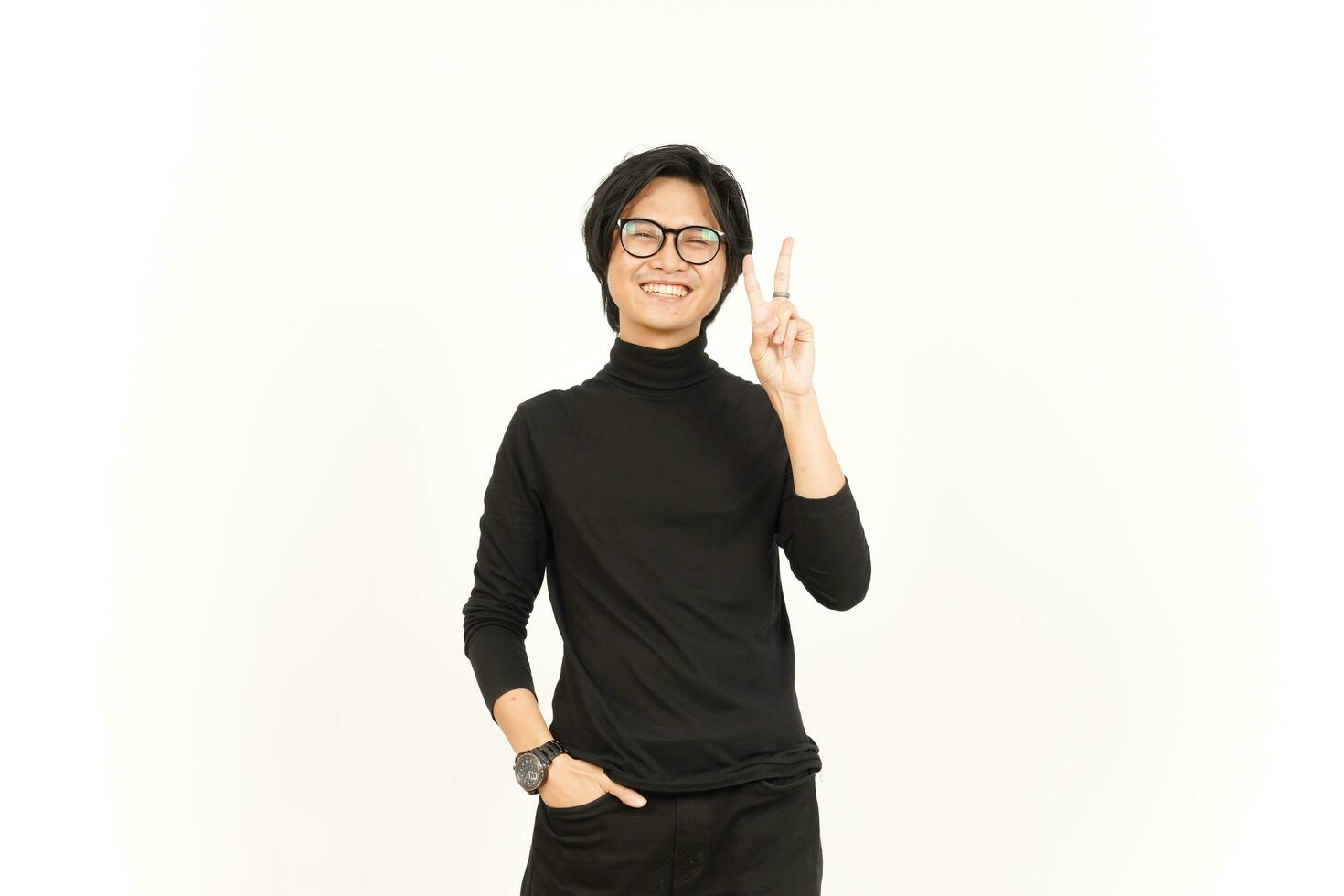 Smile and Showing Peace Sign Of Handsome Asian Man Isolated On White Background photo