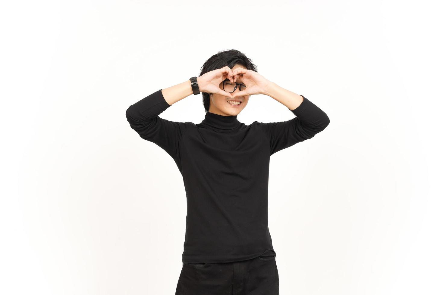 Smile and Showing Love Sign Of Handsome Asian Man Isolated On White Background photo