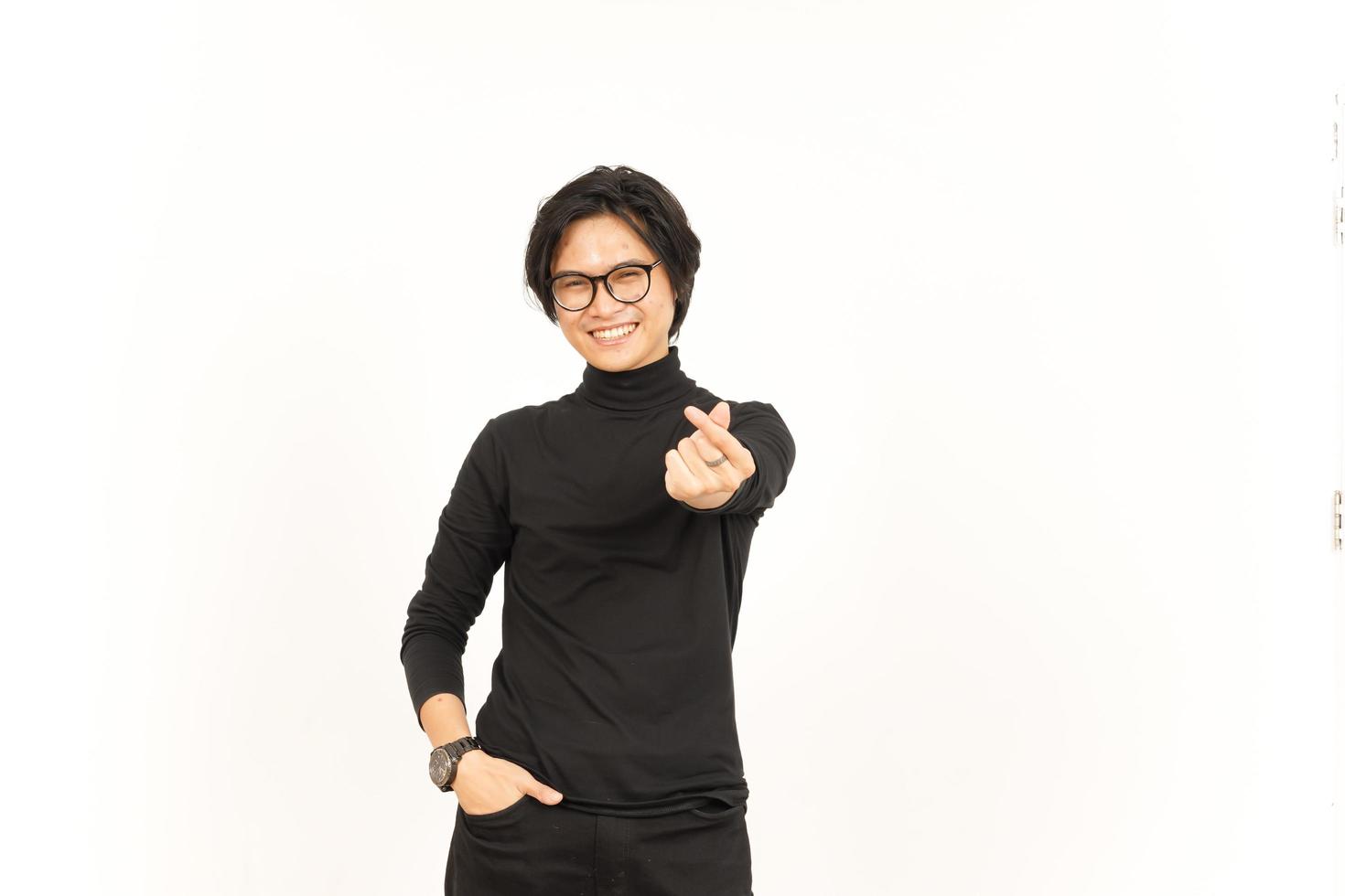 Smile and Showing Korean love finger Of Handsome Asian Man Isolated On White Background photo