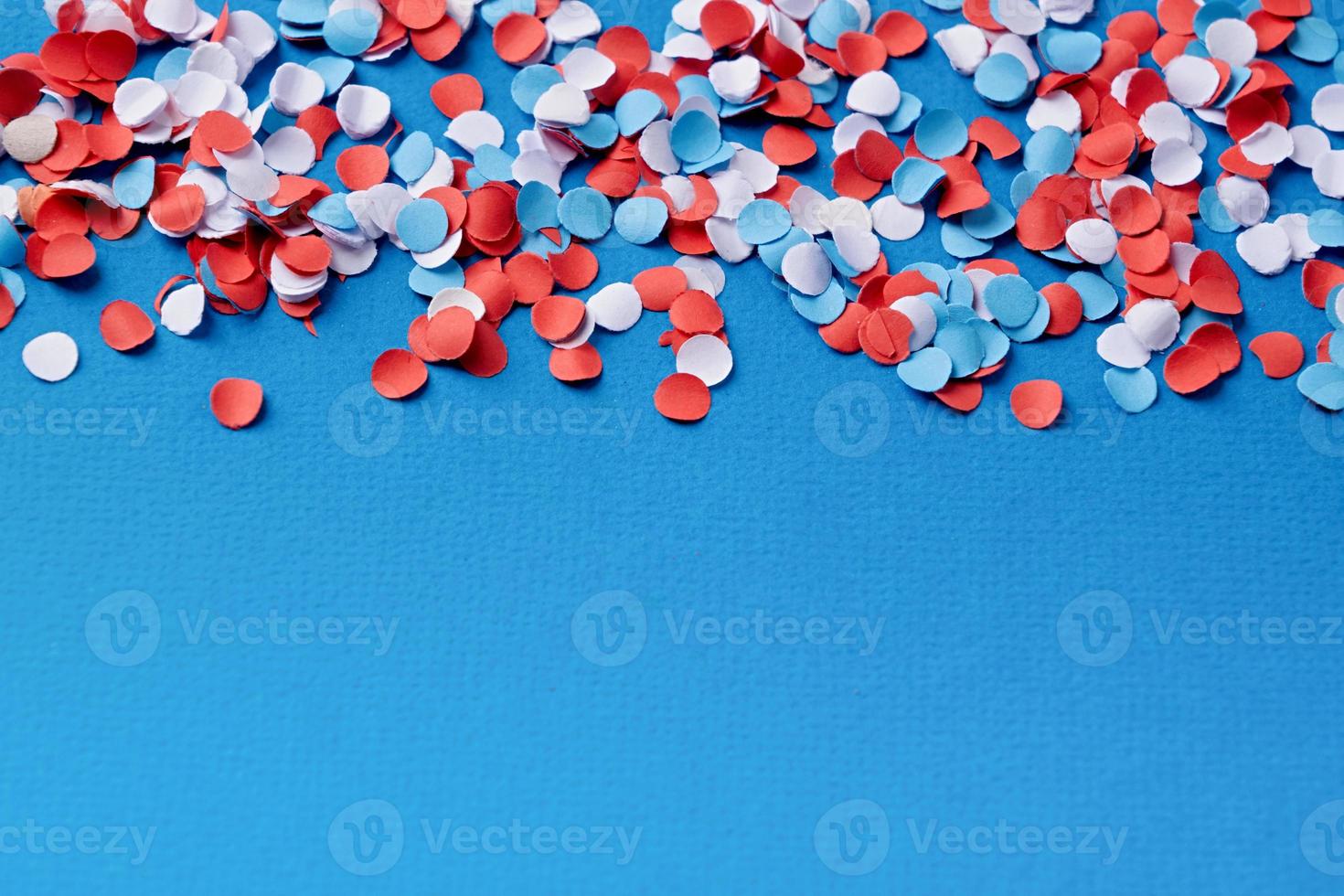 colorful circle shape confetti from shredded paper , decorations for fourth july photo