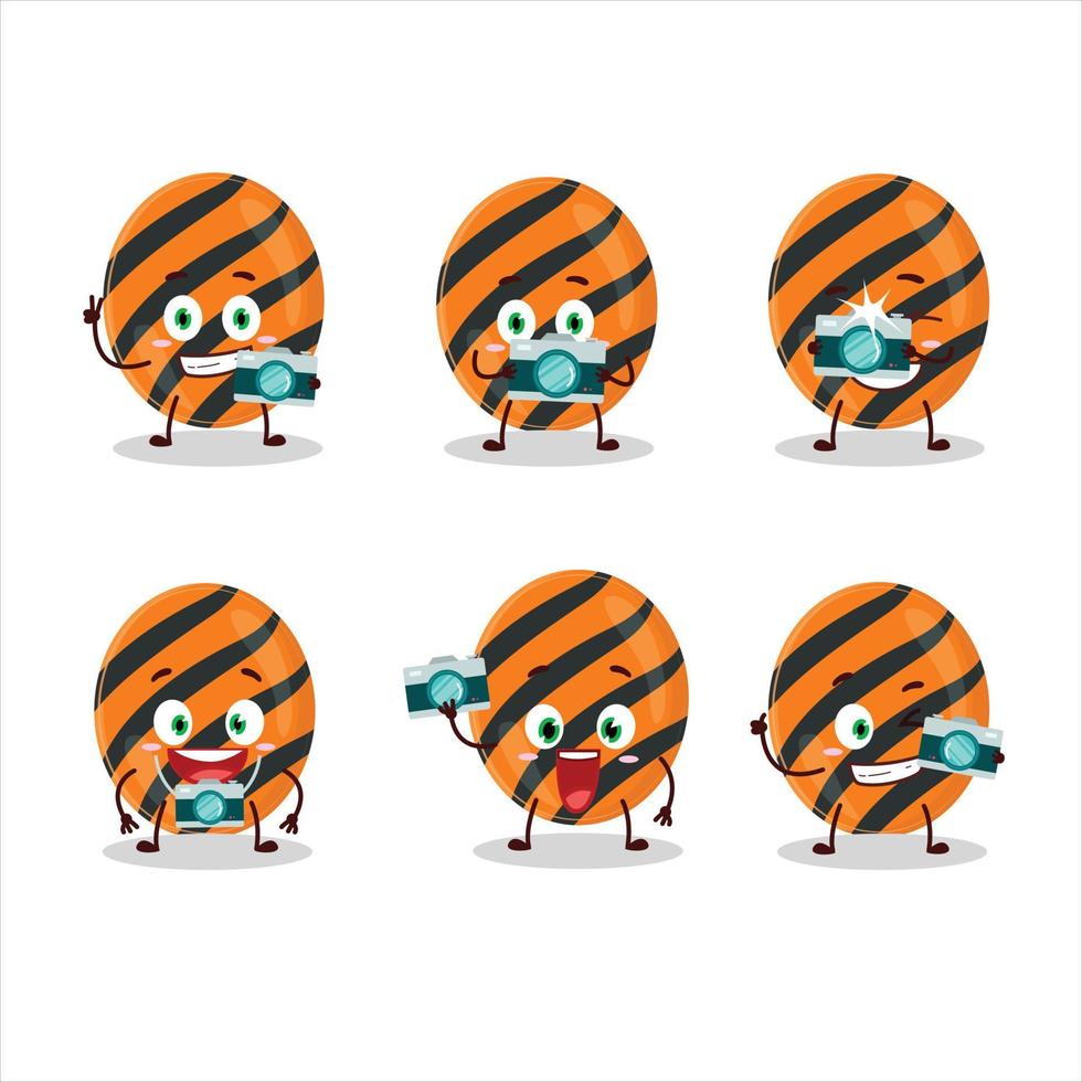 Photographer profession emoticon with halloween stripes candy cartoon character vector