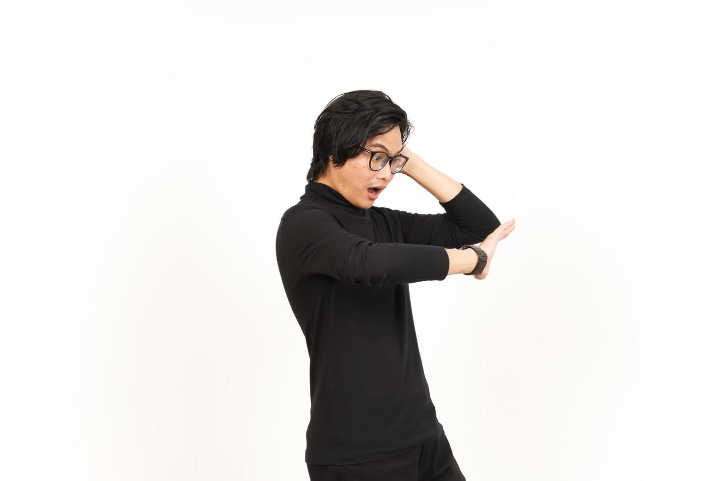 Looking for watch and shocked for late Of Handsome Asian Man Isolated On White Background photo