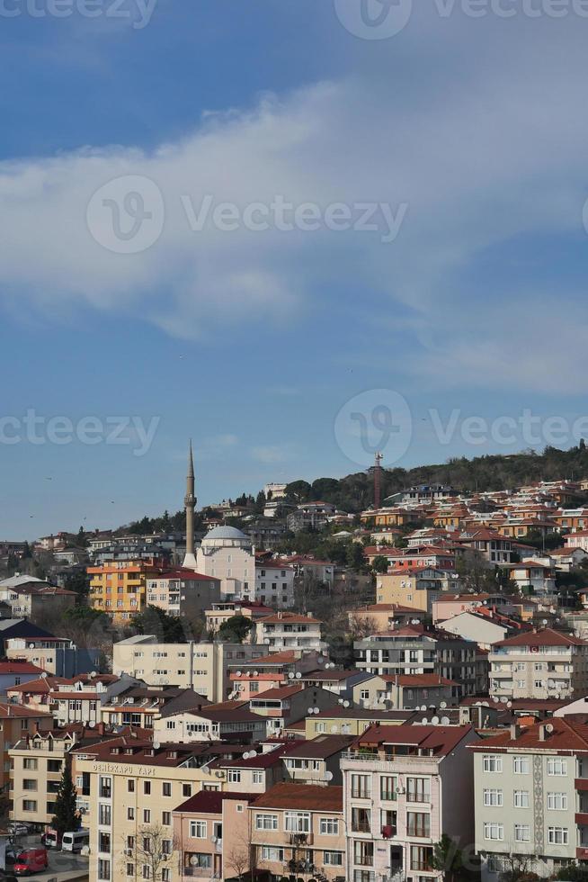 Istanbul city buildings against blue sky photo