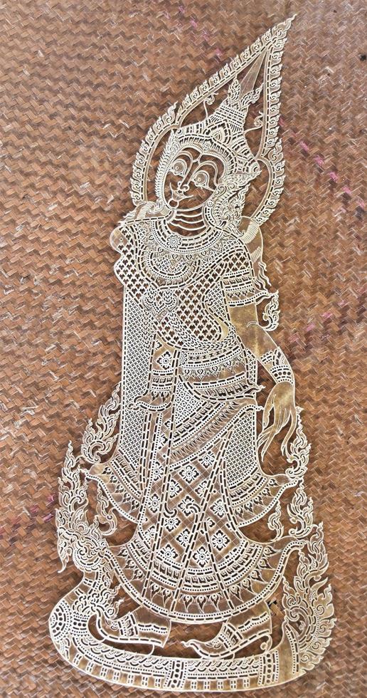 Thai pattern carving, handcrafted with cowhide of southern Thailand. photo