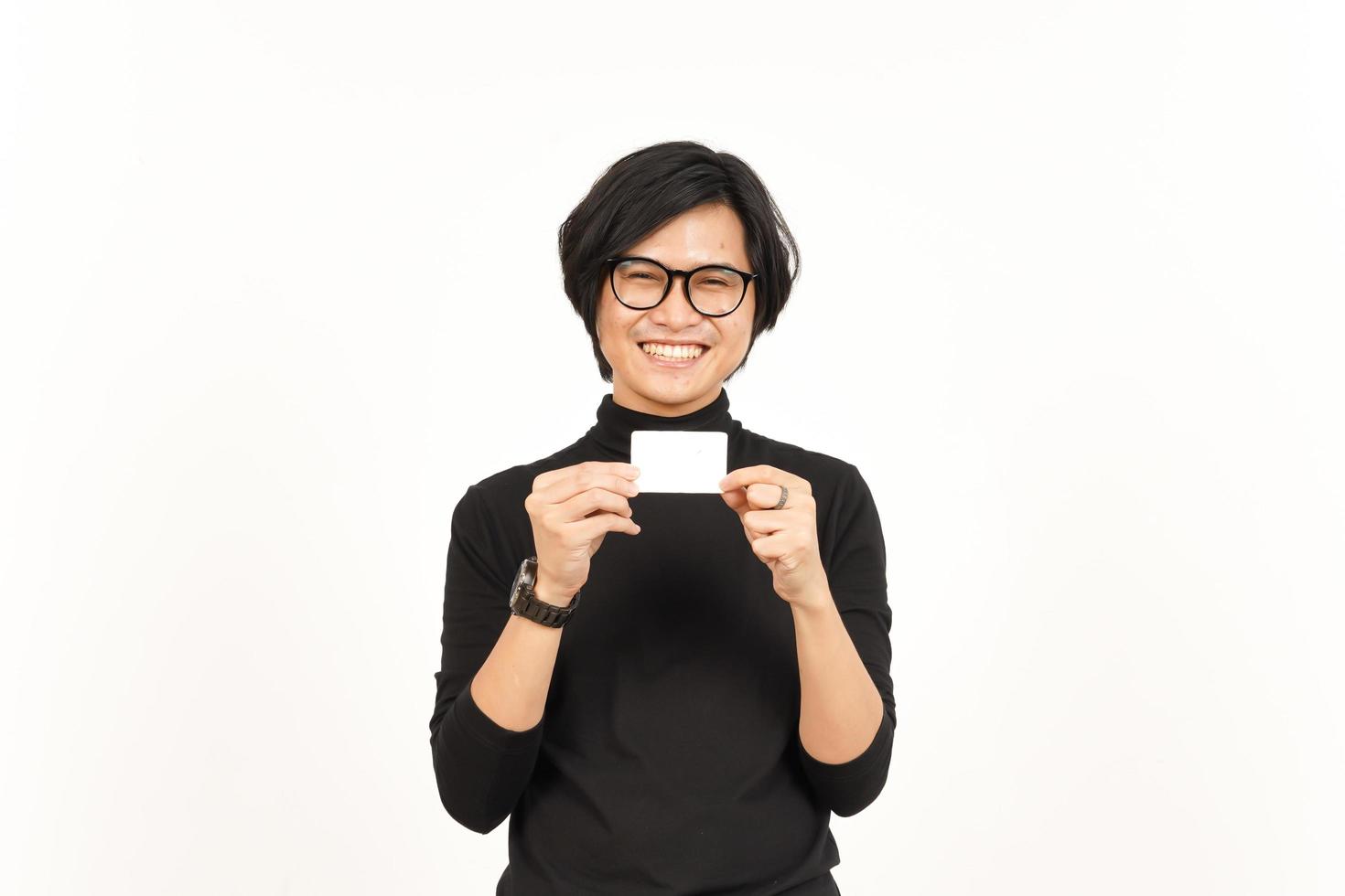 Holding and Showing Blank Credit or Bank Card Of Handsome Asian Man Isolated On White Background photo